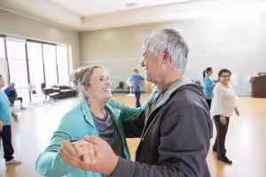 A senior couple enjoying their dance lesson.