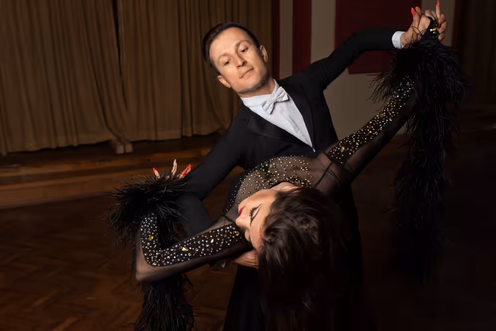 Ballroom dancers in elegant pose.